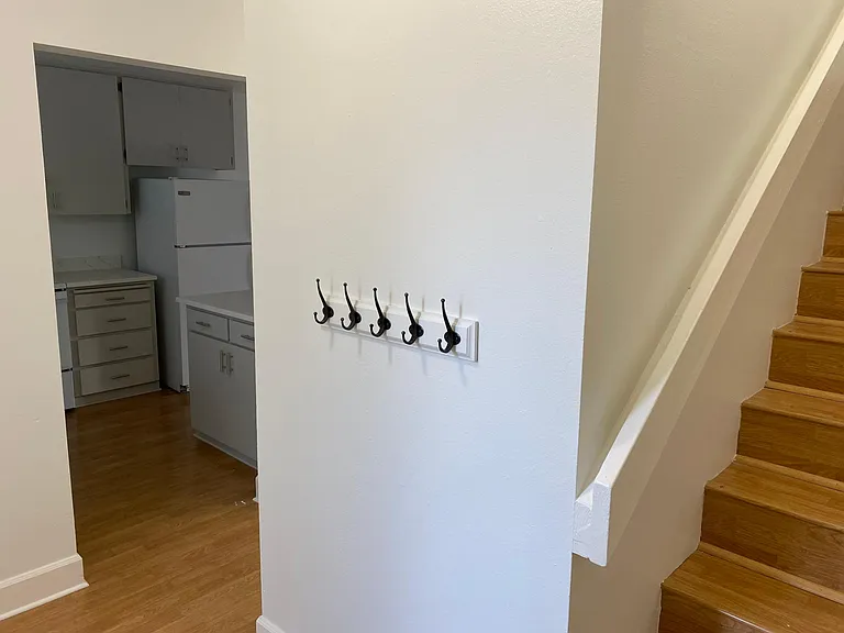 entry- stairs leading to bedrooms and full bath