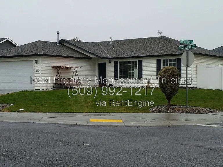 6305 Thistledown Dr — Photo 1