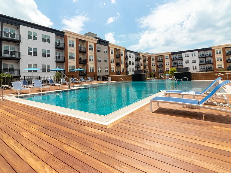 There's plenty of chairs so you can relax on the poolside sundeck.