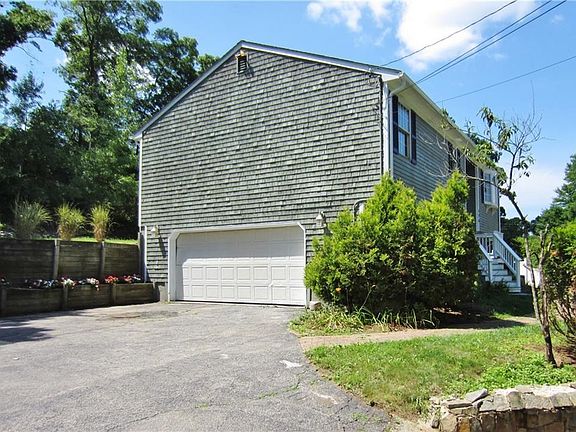 Big 2 Car Garage, Nice Walkways and Flower Beds!
