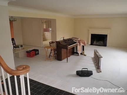 View from kitchen into family room
						:
						The family room has the built in desk and book shelves. The view is great!