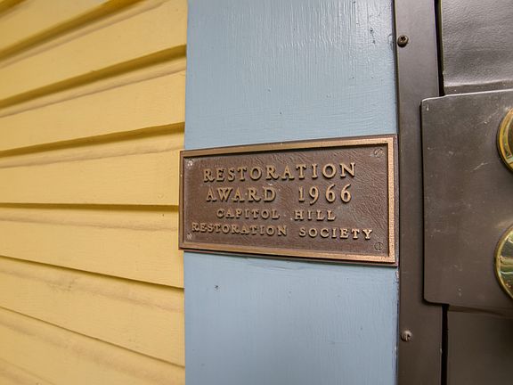 The front section of the house was built in the 1850s and lovingly preserved in the 1960s when the mid-century modern back section was added. The house received one of the Capitol Hill Restoration Society's earliest awards for this work.