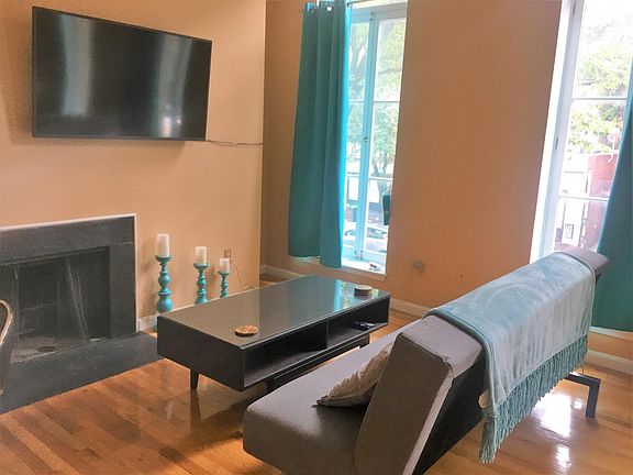 Living room with coffee table and fireplace
