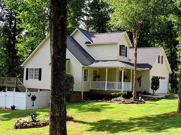 Left side View With Palmetto Lawn Art Accents !