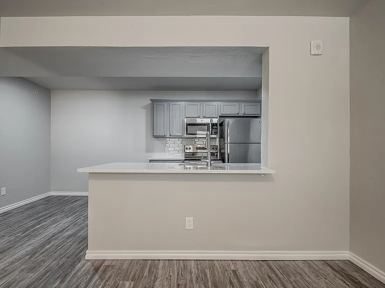 Experience modern elegance with this beautifully designed kitchen, perfect for culinary adventures.