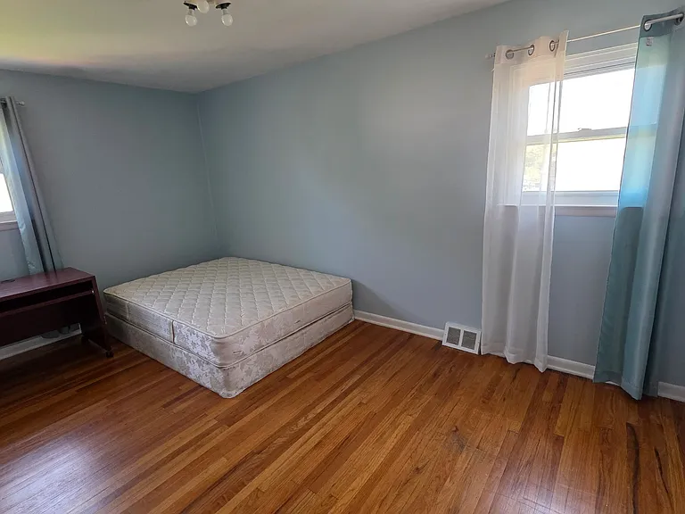 another bedroom with a closet