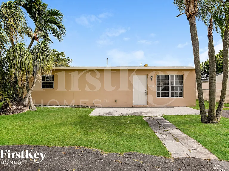 5980 NW 24th Ct — Photo 1