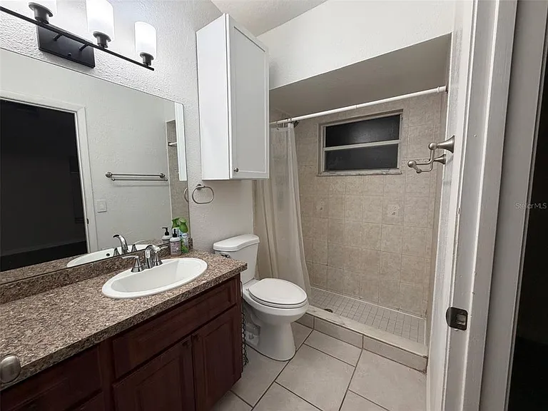 7242 Ashmore Dr — Photo 9