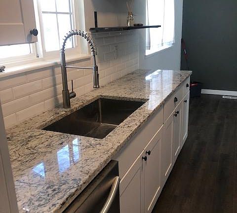 Beautiful granite counters, high end fixtures and all....
