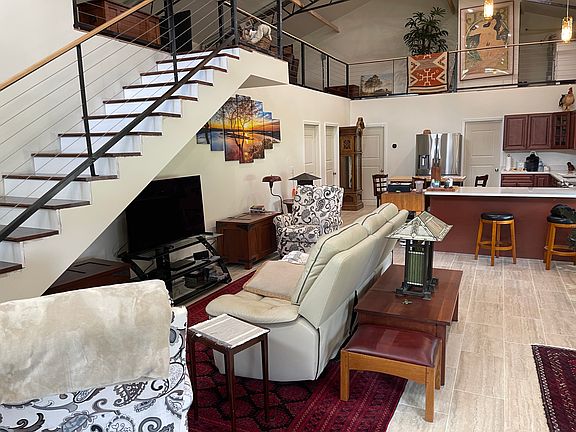 plenty of room downstairs and upstairs. Never get tired of the open layout.