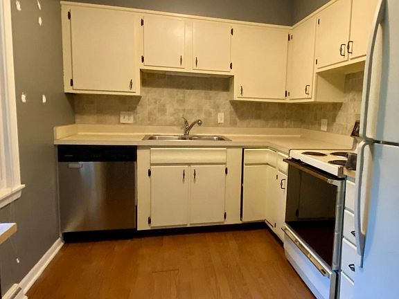 Tons of cabinet space, along with dishwasher, electric stove and refrigerator.