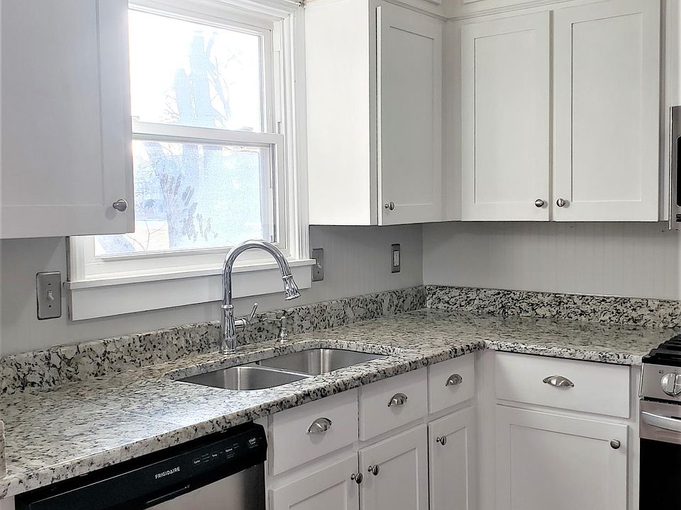 Newly upgraded kitchen with granite counter and stainless appliances