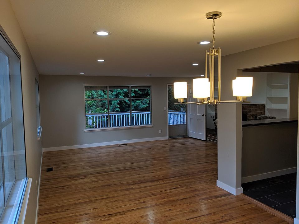 Living Room + Dining Room (Refinished Original Hardwood floor, Recessed light, Huge Windows overlooking private backyard)