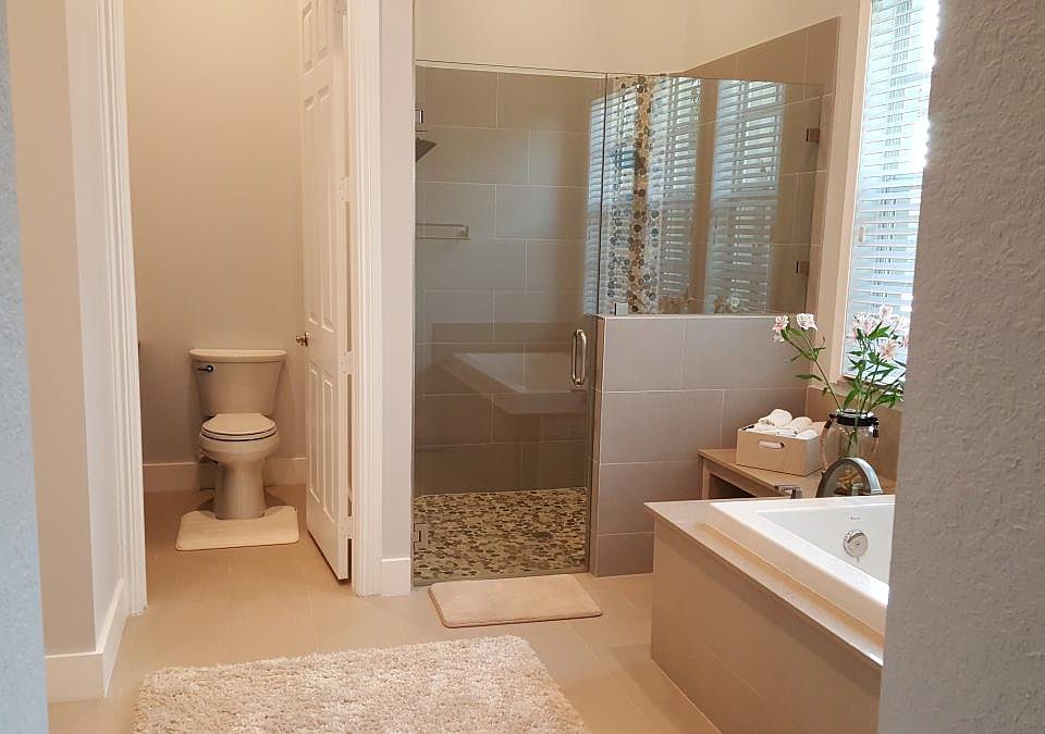 View into Bathroom and Double Shower