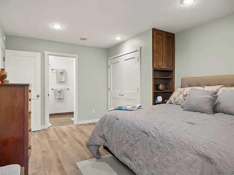 Primary bedroom ensuite with attached full bathroom.