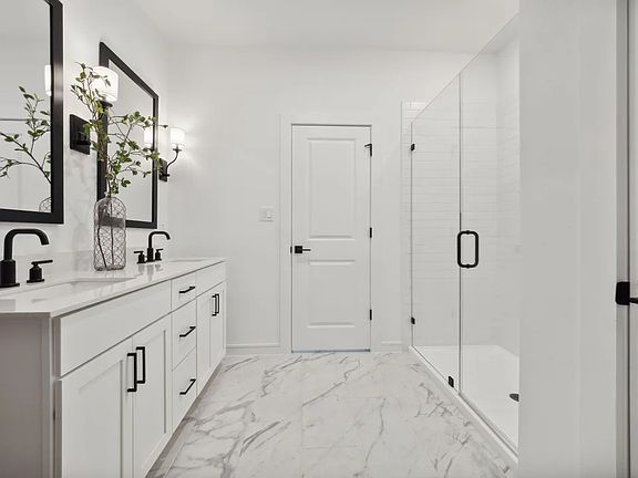 Primary bath with matte black accents