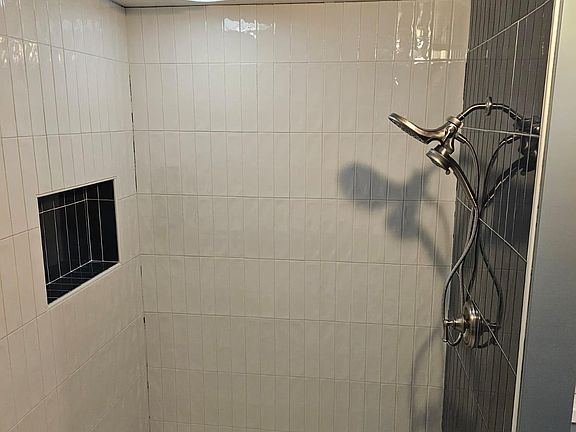 Just renovated, tiled, Primary walk in shower