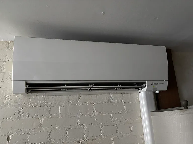 Mini-split heat pump now in middle of left wall.