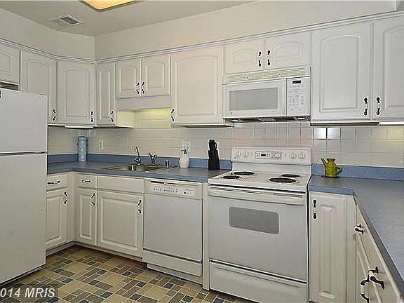 5th image of 5705 Brewer House Cir APT 302