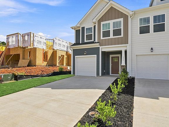 Exclusive end-unit villa in Barton Hollow with elegant design and high standards
