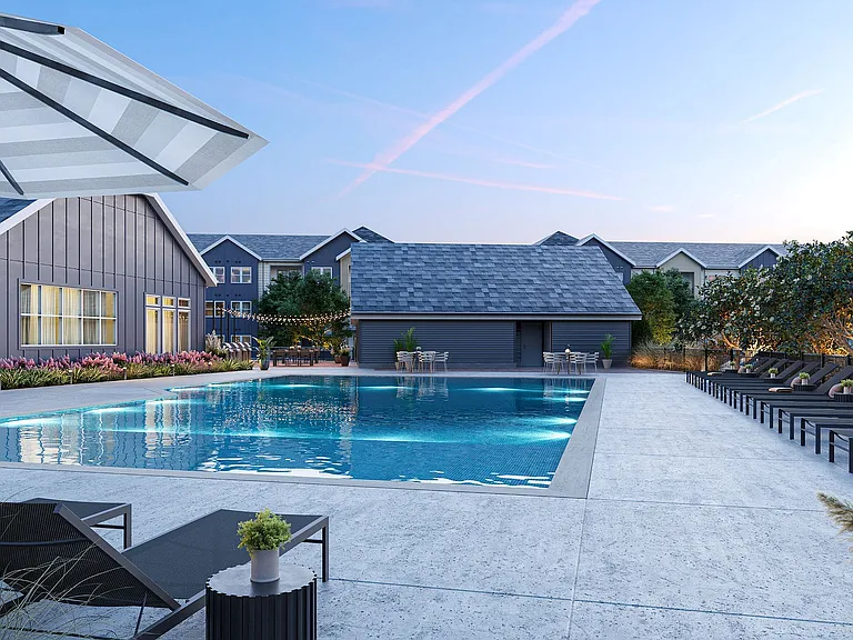 Resort-Style Swimming Pool and Sun Deck at Archer Eastfield Station Apartments
