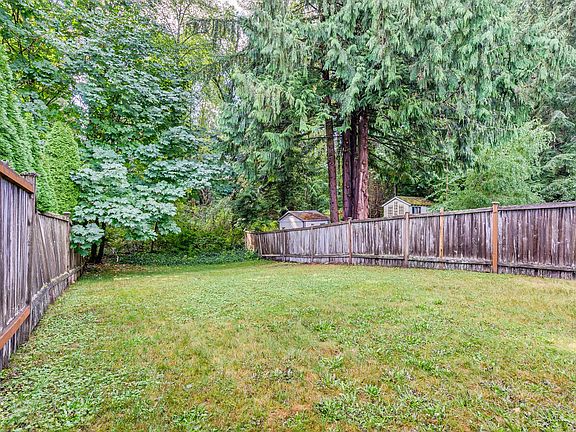 Beautiful, quiet green belt offers shade and privacy.