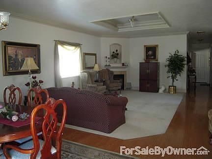 Large Great Room opens into dining area : Gas fireplace with mantle. Tray ceiling. Special lighting.