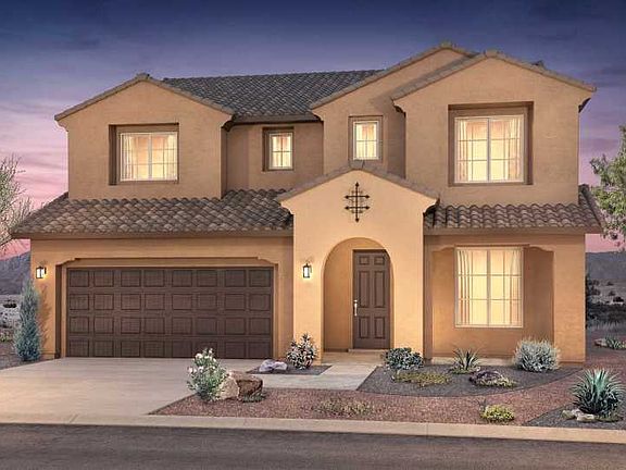 Popular two-story home design featuring a first floor owner s suite and a soaring two-story gatherin