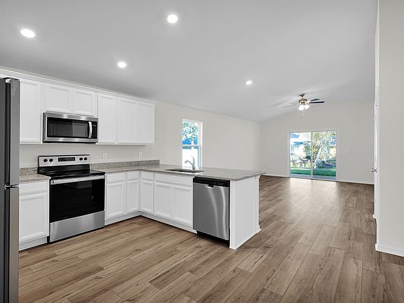 Be the host with the most with this open-concept entertainment area