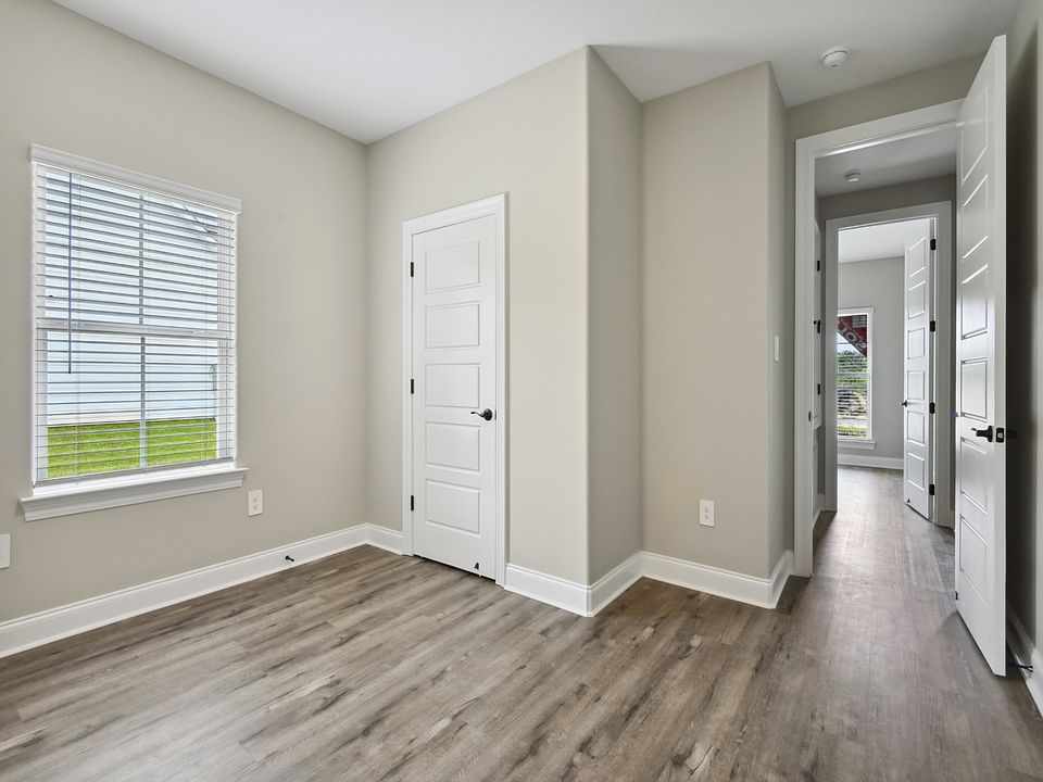 Secondary bedroom in the Sandpiper floorplan at a Meritage Homes community in Gulfport, MS.