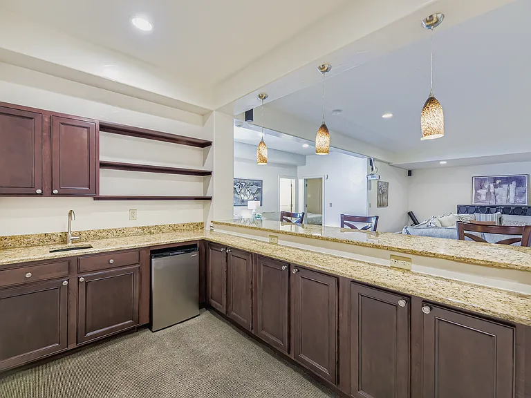 BASEMENT BAR WITH SINK AND MINI FRIDGE