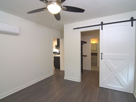 Bedroom with a walk-through closet to the bathroom