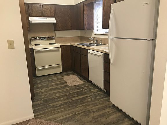 Kitchen, washer/dryer hookups to the left