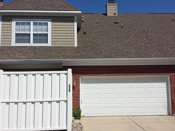 2 car Attached Garage and Private Patio on the back