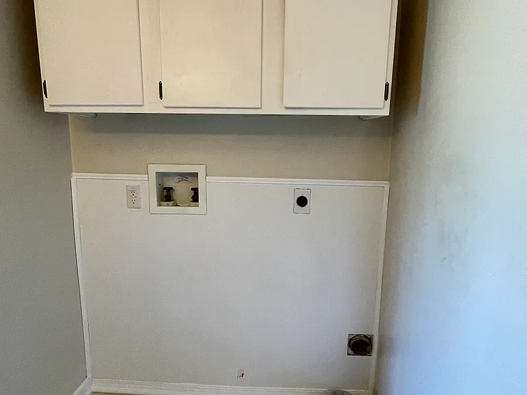 washer dryer hookup in _ bath.