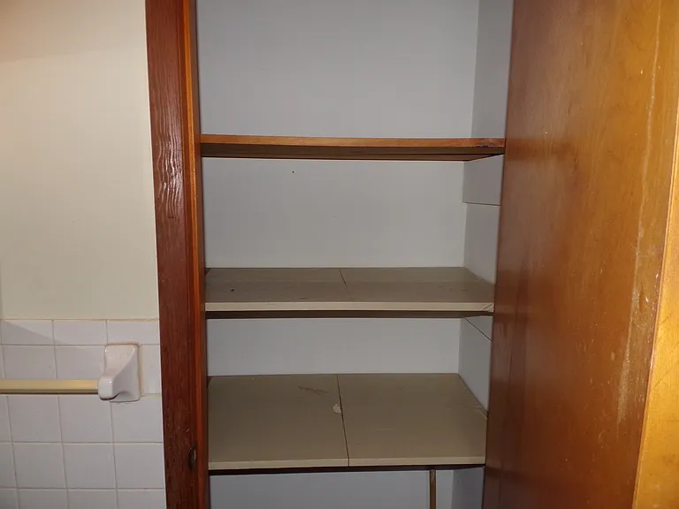 Linen closet in bathroom