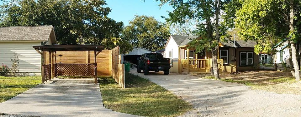 Panoramic view of front and neighbor