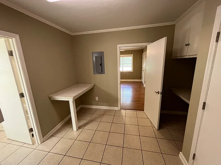Combination laundry/office area adjoining master bedroom