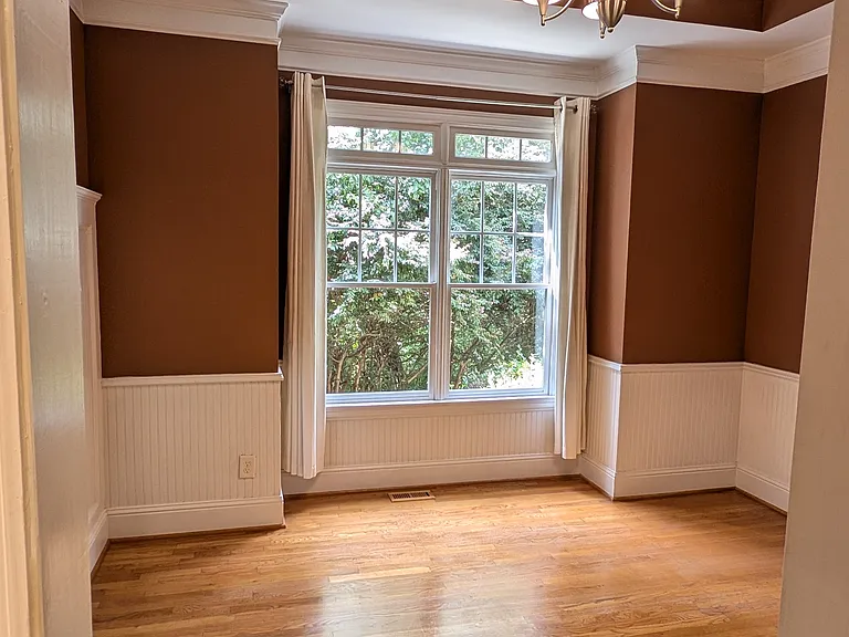 Dining room off the butler's pantry and foyer.