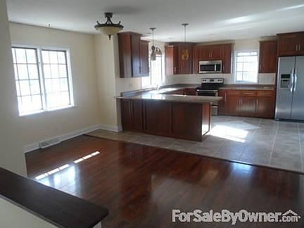 Upstairs kitchen
						:
						All new cabinets, flooring, and appliances
