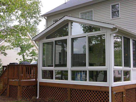 Custom built sunroom w/ lots of light.