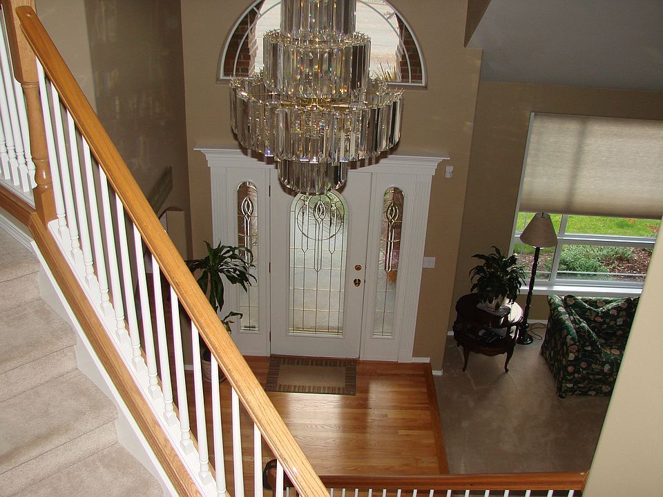 looking down the stairs to the entry hall
