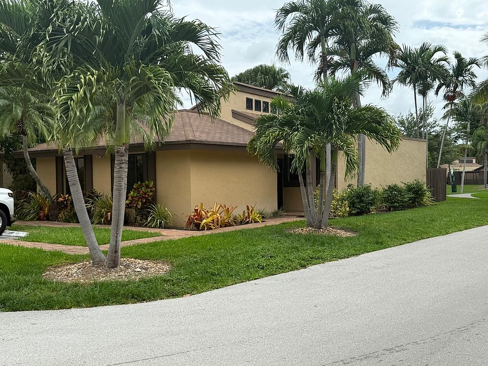 House is lake front, located at the corner of SW 131st Street and 91st Ct