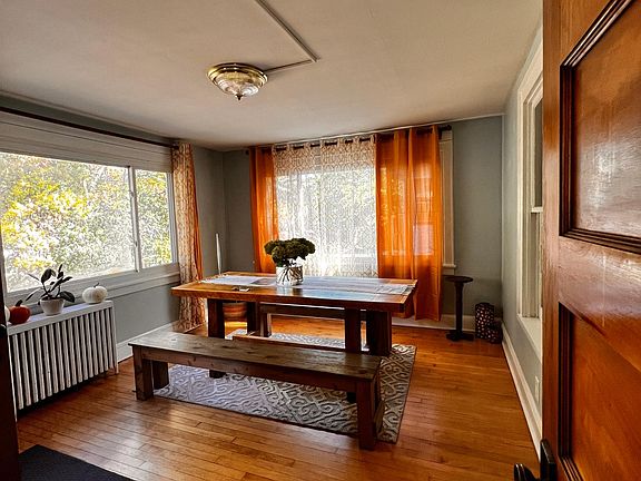 sun room just off deck and kitchen can be used for formal dining or living room space