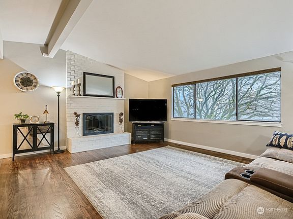 Beautiful clean lines and large windows accentuate this living room>