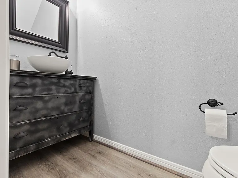 Refresh yourself with this convenient half-bath on main level