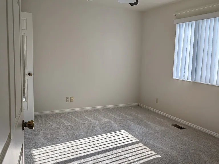 Bedroom 2. New carpet, walk-in closet.