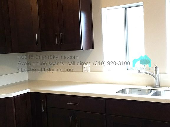 Brand New Kitchen with Stainless Steel Appliances and Quartz