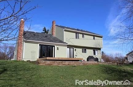 Back of Home
						:
						New door wall and French Doors in 2013