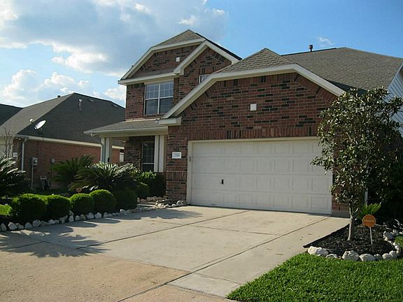 Right side view of home. Security Camera system on home